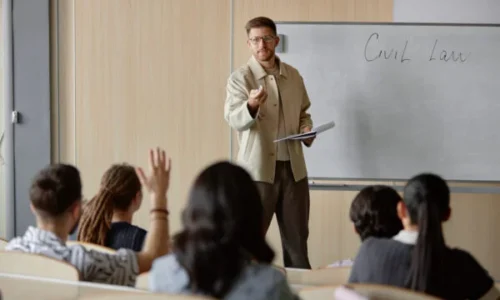 male-professor-teaching-law-course-in-lecture-hall-2025-03-08-03-04-37-utc-600x400-1