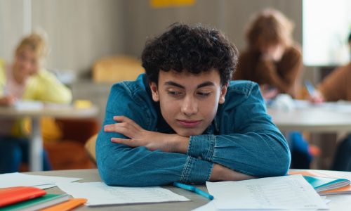 Tired sleepy napping exhausted fatigued overworked overload pupil teen boy teenager sleep student guy teenage generation man male schoolboy health problem boring class lesson sleeping at table school. High quality 4k footage