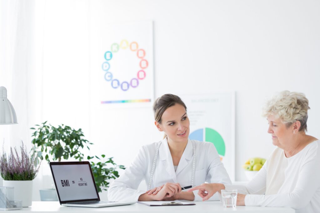 overweight woman consulting her diet with professi utc scaled