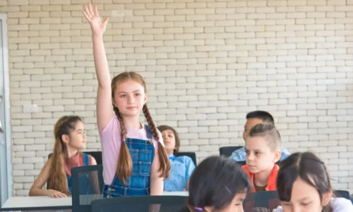 elementary-school-female-students-stand-and-raise-2025-01-08-14-25-03-utc-2048x1468