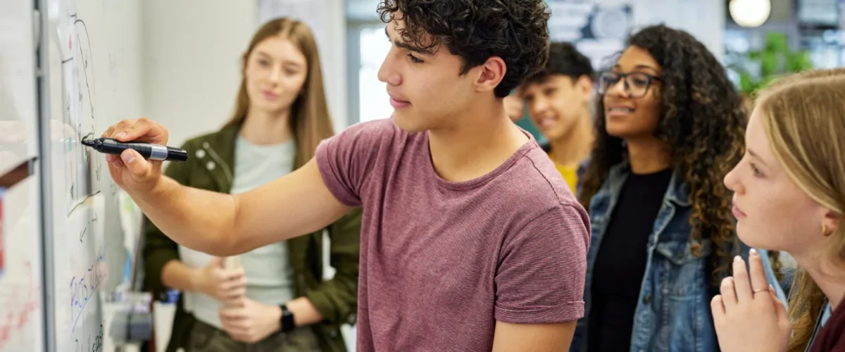 teen-student-solving-math-equation-on-whiteboard-a-2025-08-06-17-59-14-utc-1536x1025